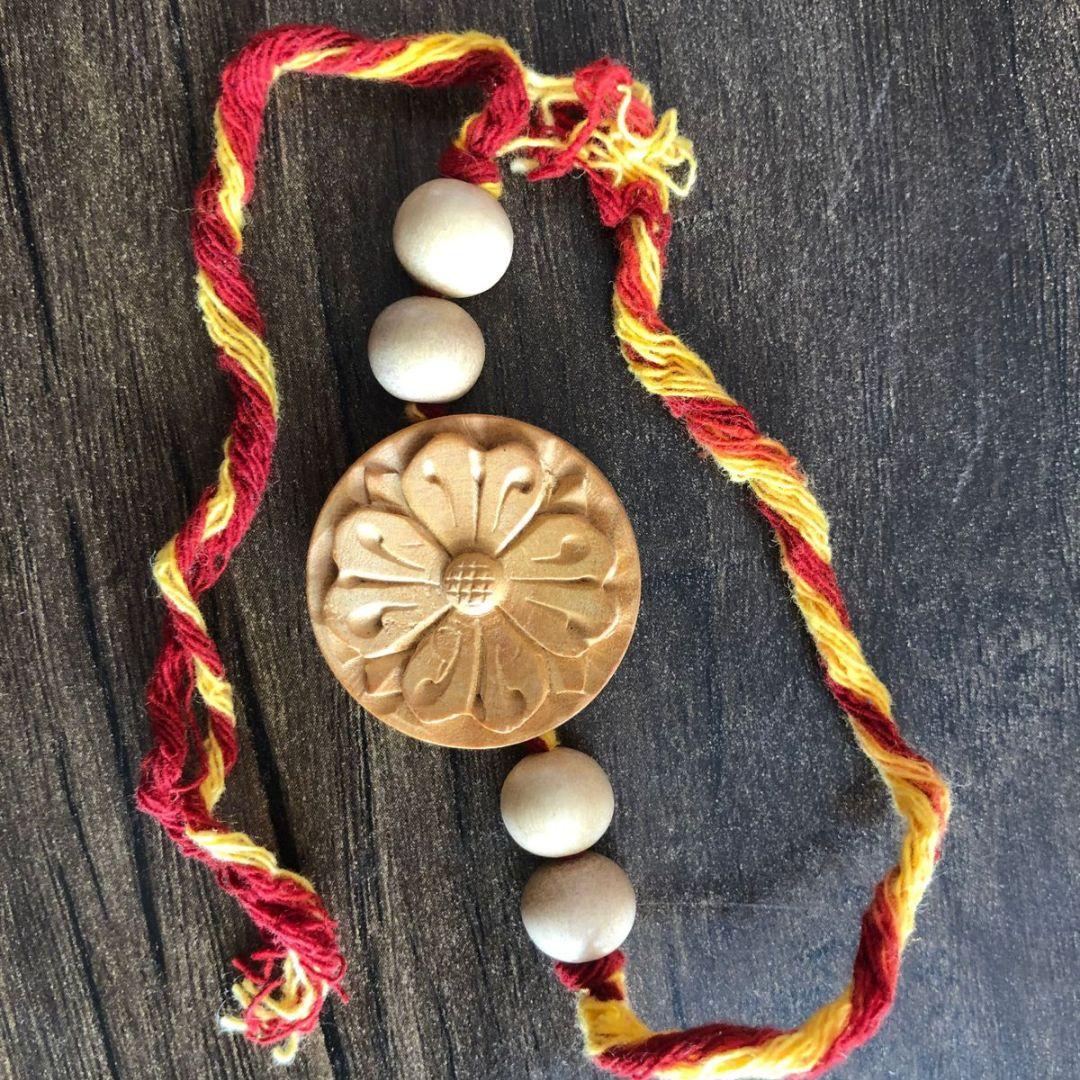 Periwinkle floral Wooden Rakhi