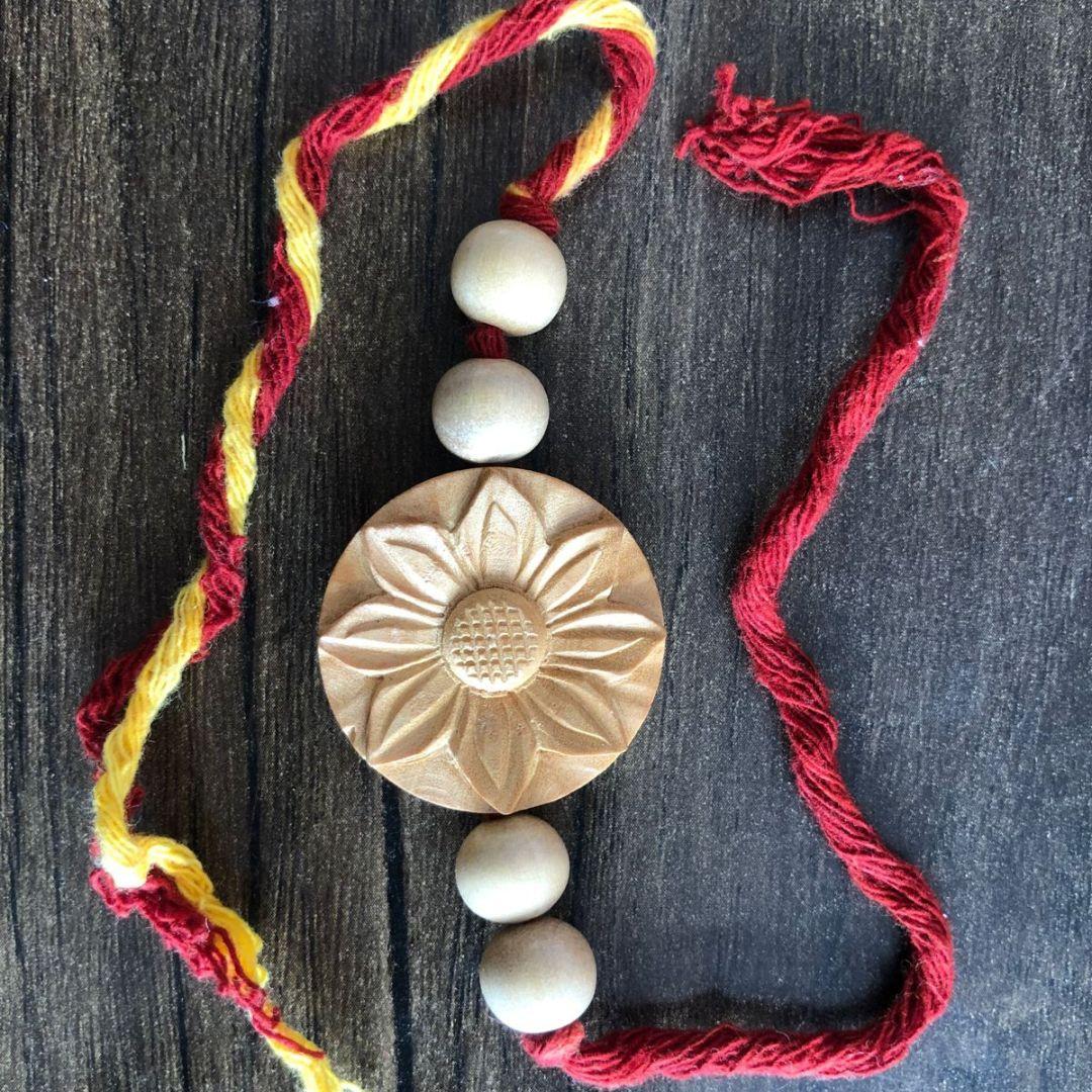 Surya floral Wooden Rakhi