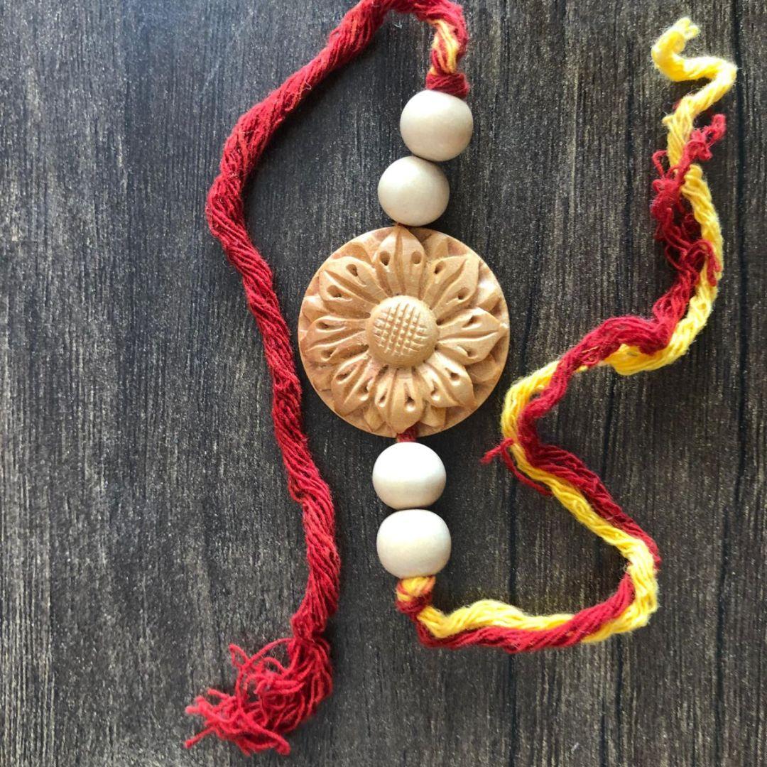 Narayana floral Wooden Rakhi