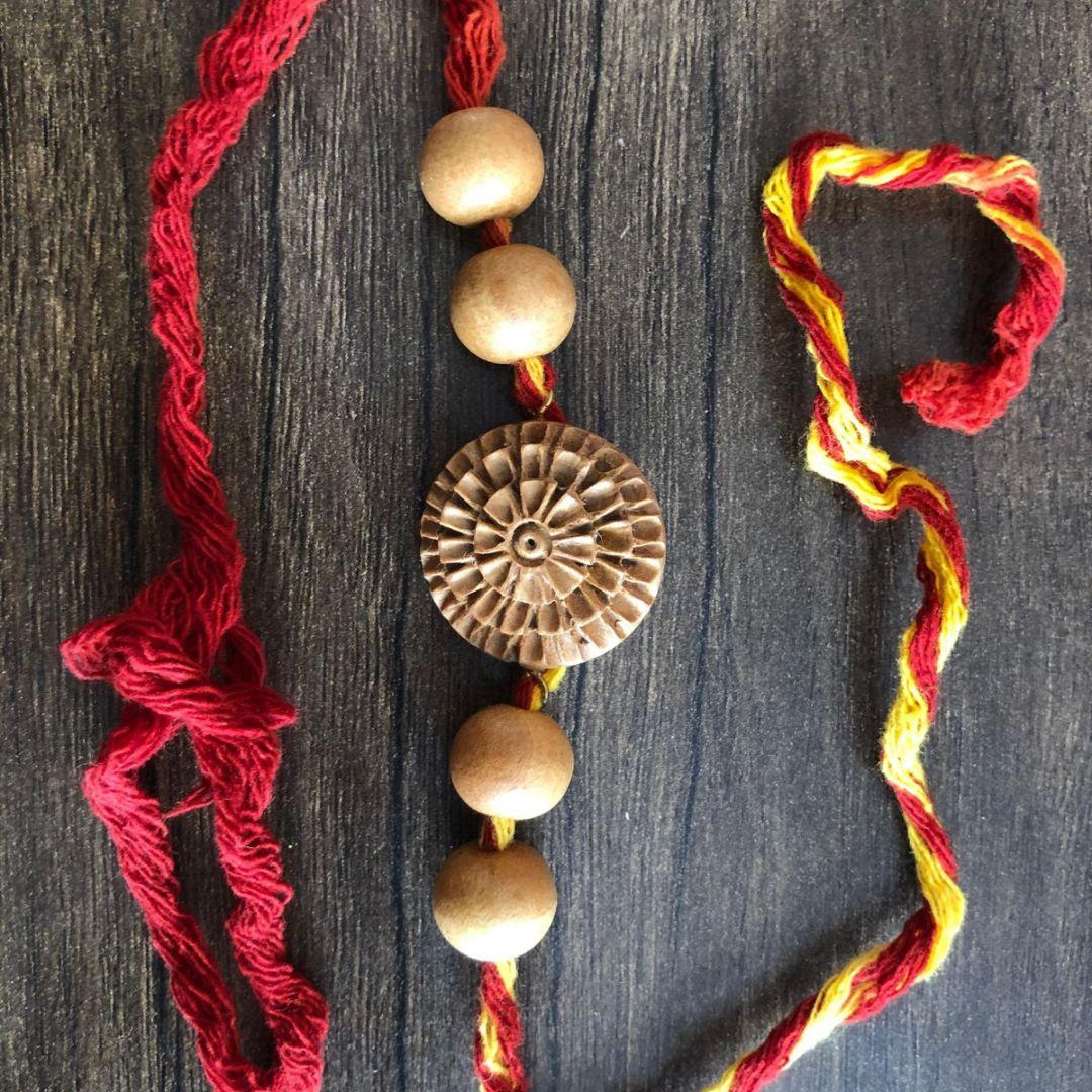 Bhrama floral Wooden Rakhi