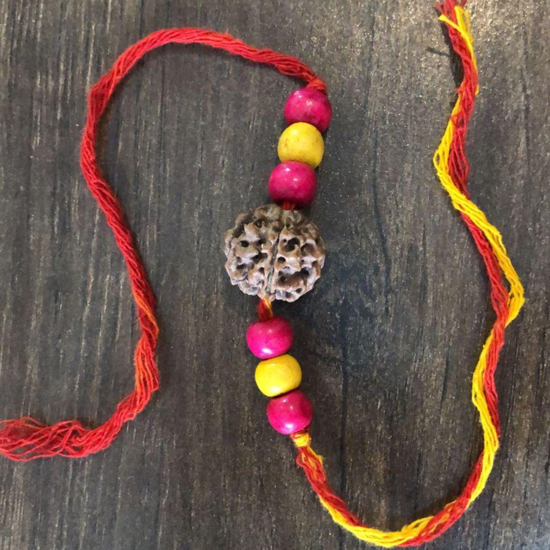Pink Yellow Rudraksh Wooden Rakhi