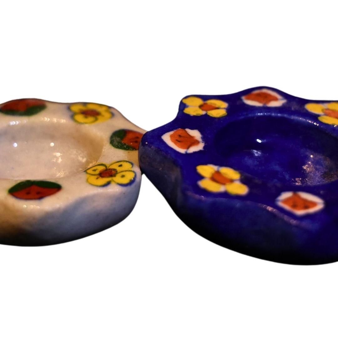 Mini flowers blue pottery tea light holders