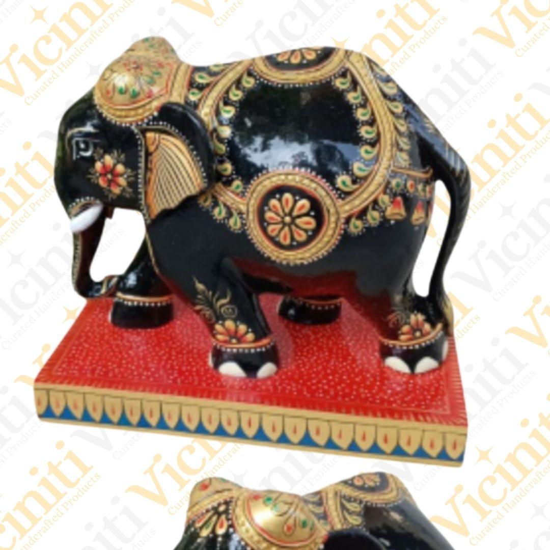Gold Fine Work Black trunk wooden elephant handcrafted showpiece with base
