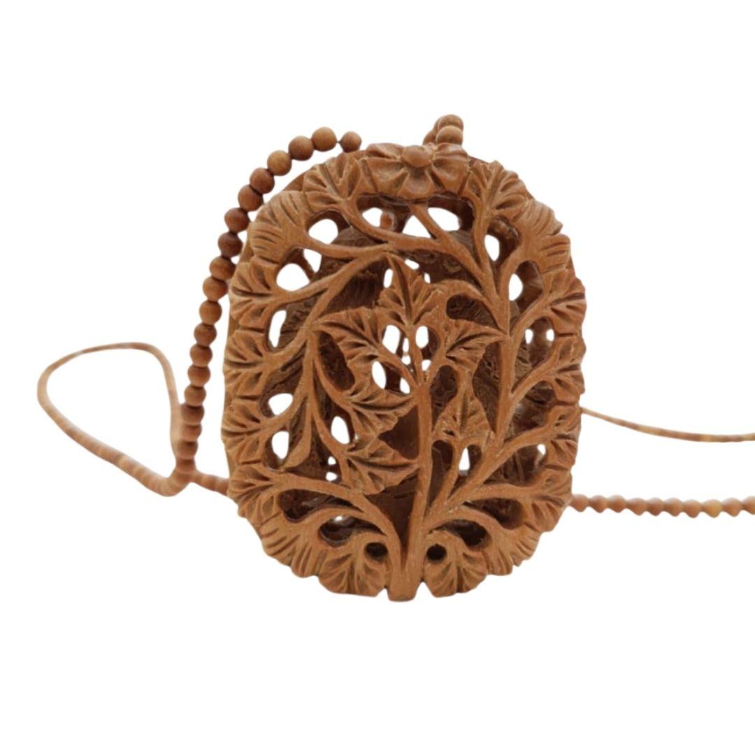 Undercut Carving Elephant Inside Wooden Necklace